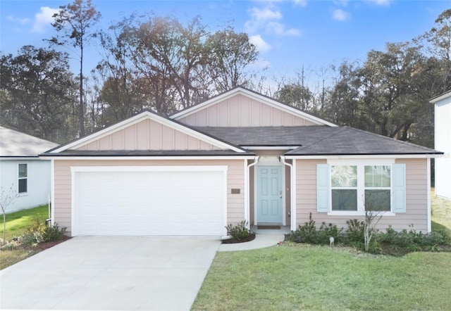 view of front facade featuring a garage and a front lawn