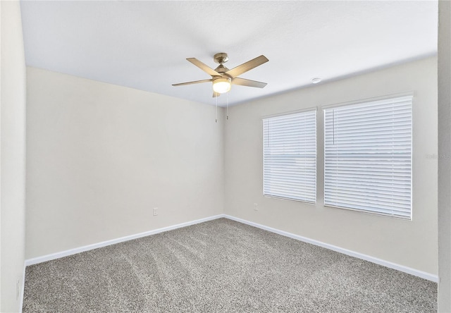 empty room with carpet and ceiling fan