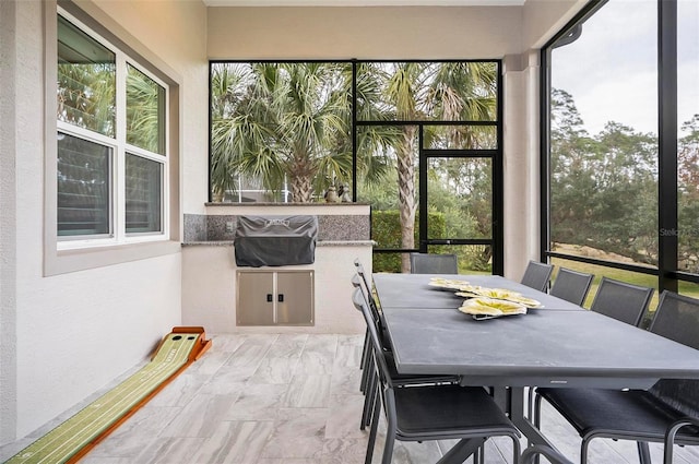 sunroom / solarium with a wealth of natural light