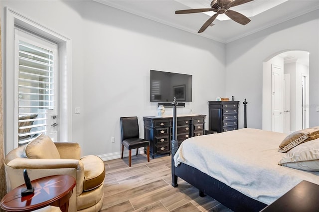 bedroom with crown molding and ceiling fan