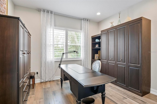 office area featuring light hardwood / wood-style flooring