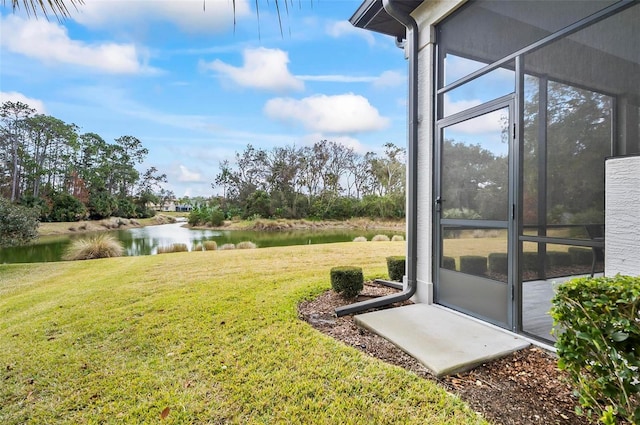 view of yard with a water view