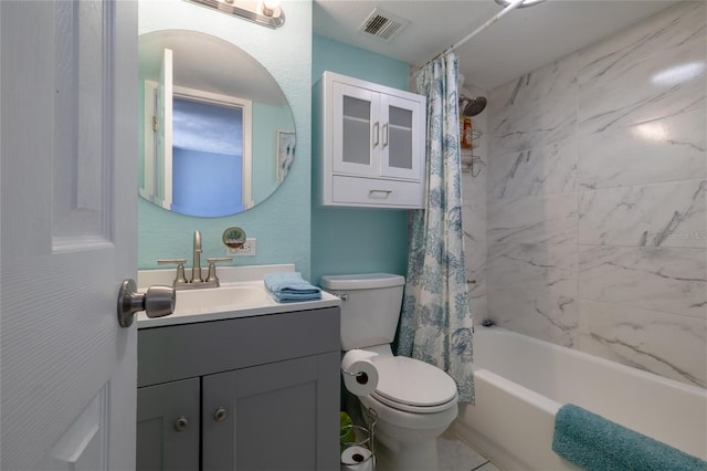 full bathroom featuring toilet, shower / tub combo with curtain, and vanity