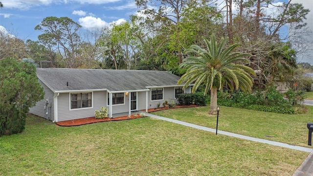 single story home with a front yard