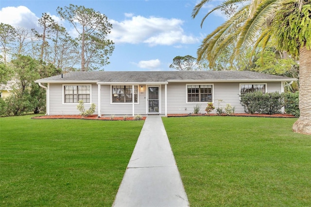 single story home with a front lawn