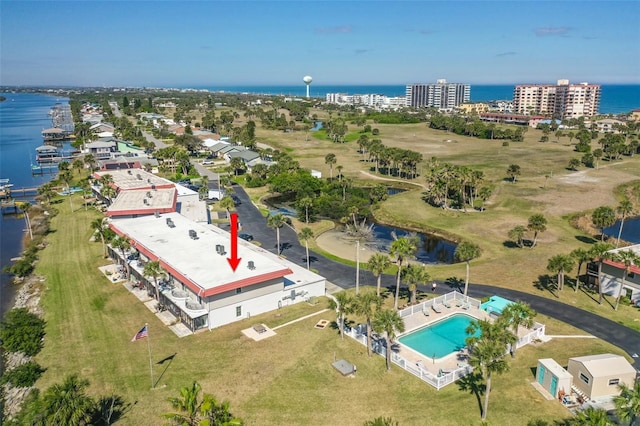 bird's eye view with a water view