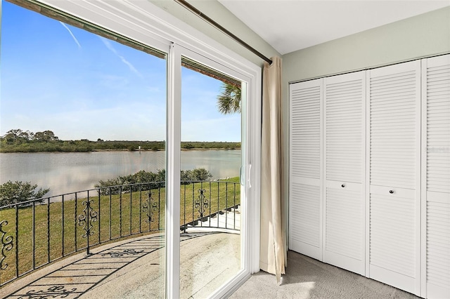 entryway featuring a water view