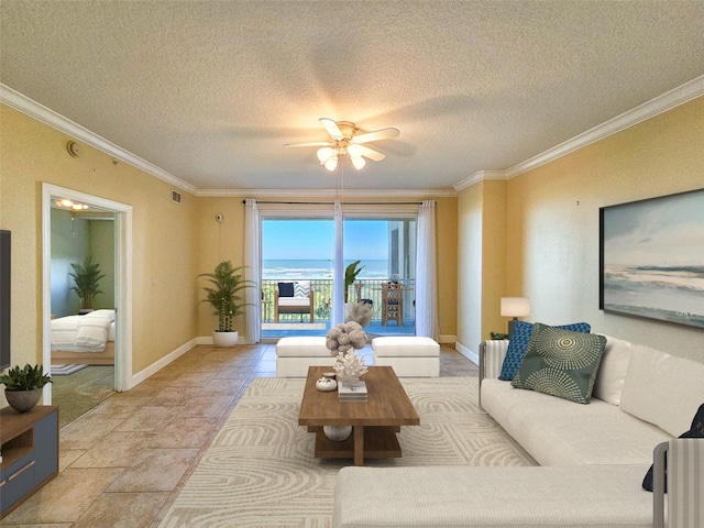 living room with crown molding, ceiling fan, and a textured ceiling