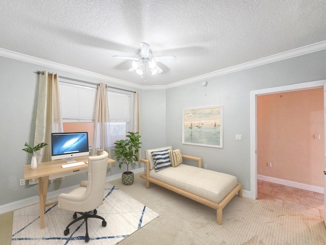 office area with ornamental molding, ceiling fan, and a textured ceiling