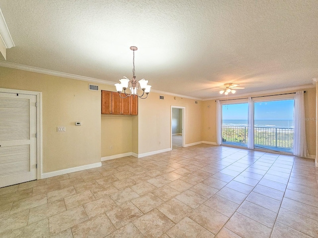 spare room with a water view, ornamental molding, ceiling fan with notable chandelier, and a textured ceiling