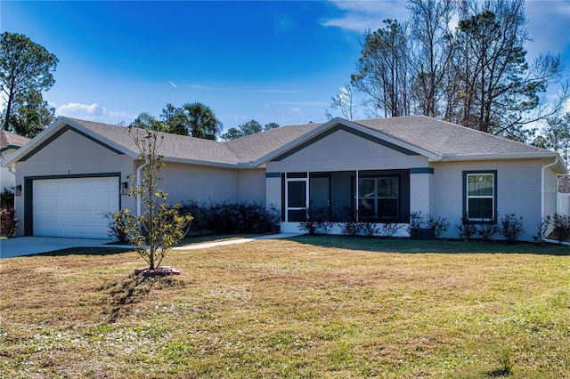 single story home featuring a garage and a front lawn