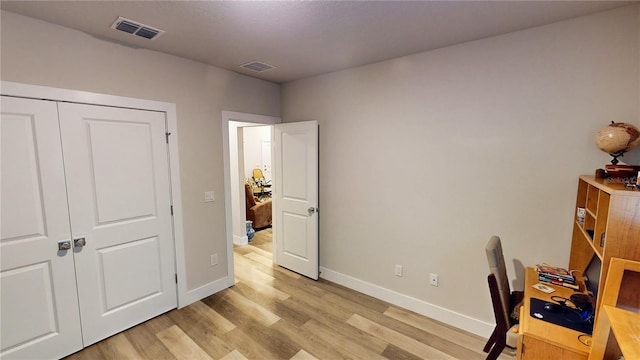 office space featuring light wood-type flooring