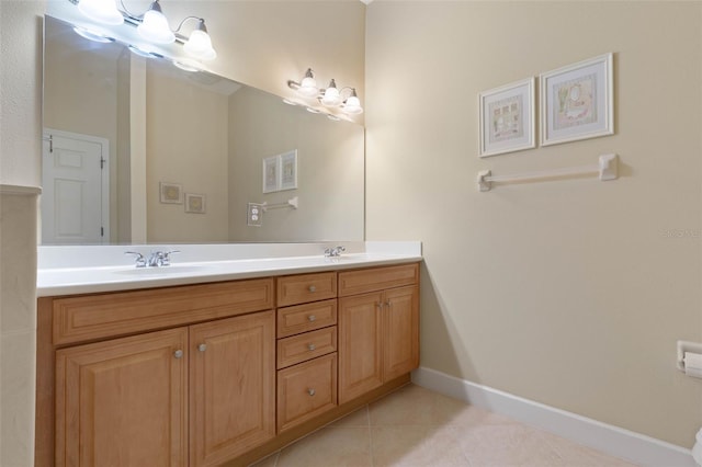 bathroom with vanity and tile patterned floors