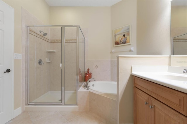 bathroom with tile patterned flooring, vanity, and separate shower and tub