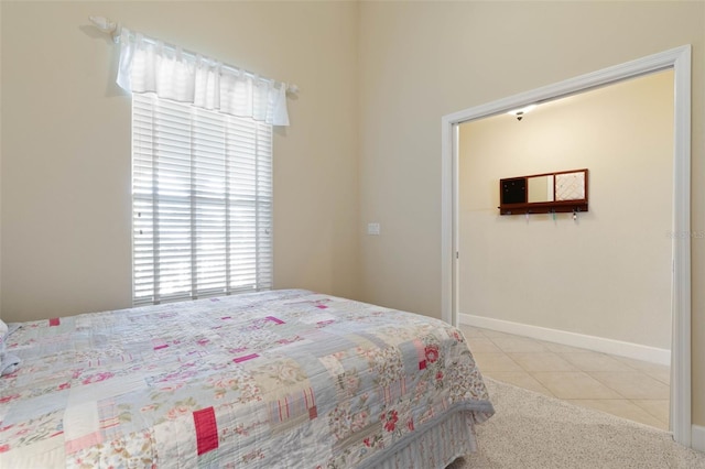 unfurnished bedroom featuring light tile patterned floors