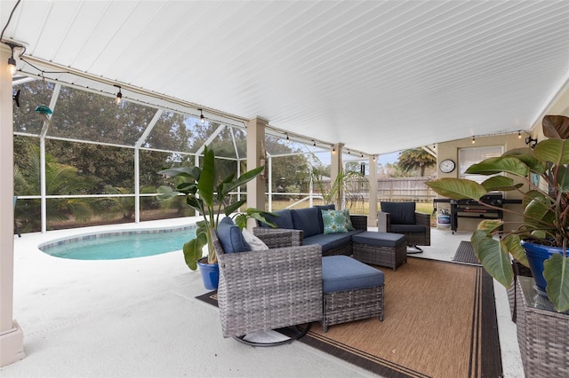 exterior space with a fenced in pool, outdoor lounge area, and glass enclosure