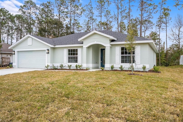 ranch-style home with a garage and a front lawn