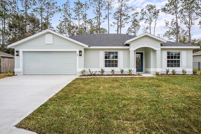 ranch-style house featuring a garage and a front yard