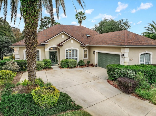 view of front of house with a garage