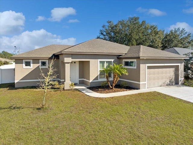 view of front facade with a front lawn and a garage