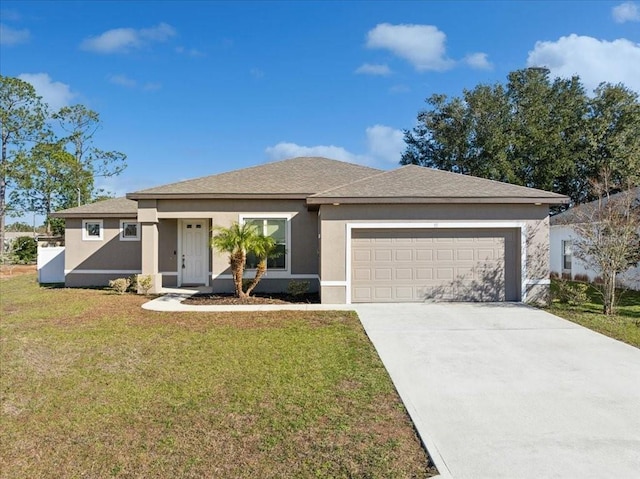 prairie-style house with a front yard and a garage