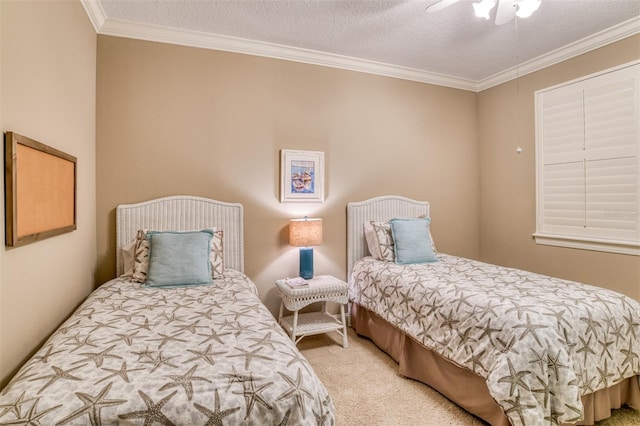 carpeted bedroom featuring ceiling fan, crown molding, and a textured ceiling