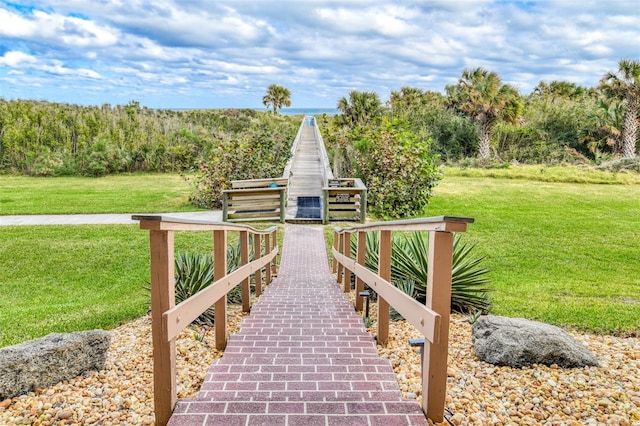 view of community featuring a lawn