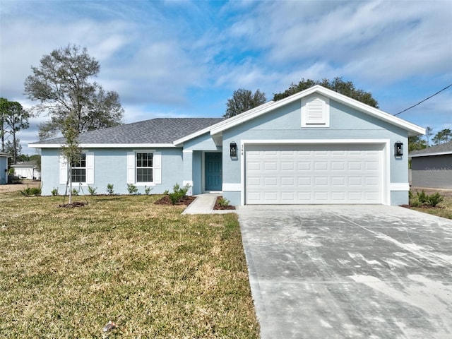 ranch-style home with a garage and a front yard