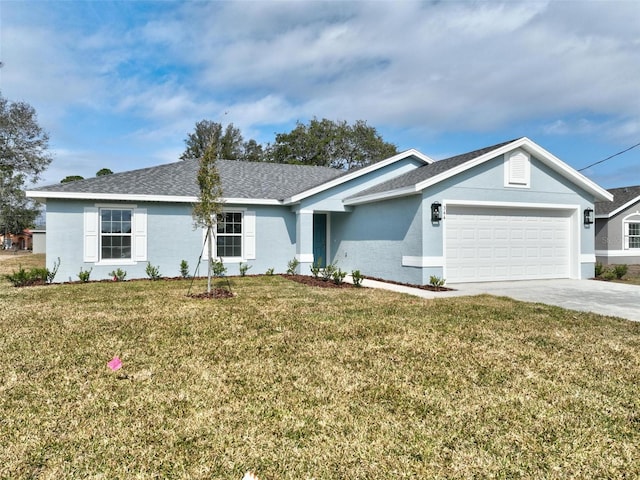 single story home with a garage and a front yard