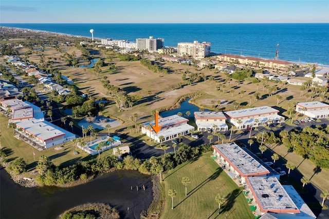 bird's eye view with a water view