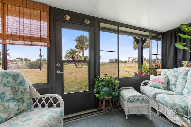 sunroom featuring a wealth of natural light