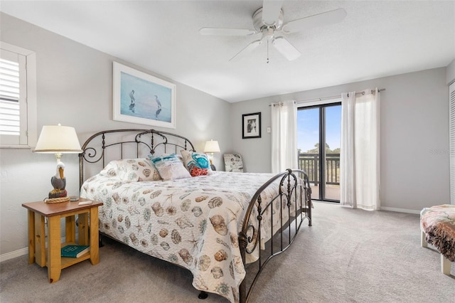 bedroom with ceiling fan, access to exterior, carpet, and multiple windows