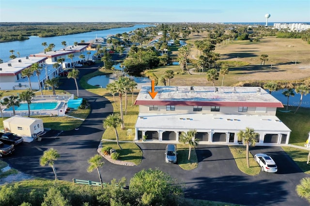 birds eye view of property featuring a water view