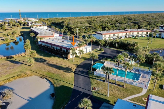 birds eye view of property featuring a water view