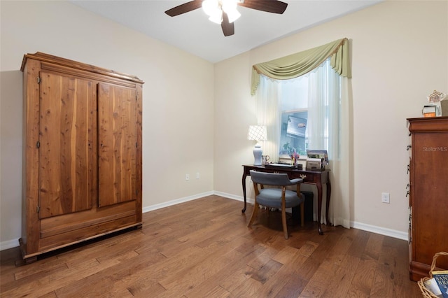 office area with ceiling fan and hardwood / wood-style floors