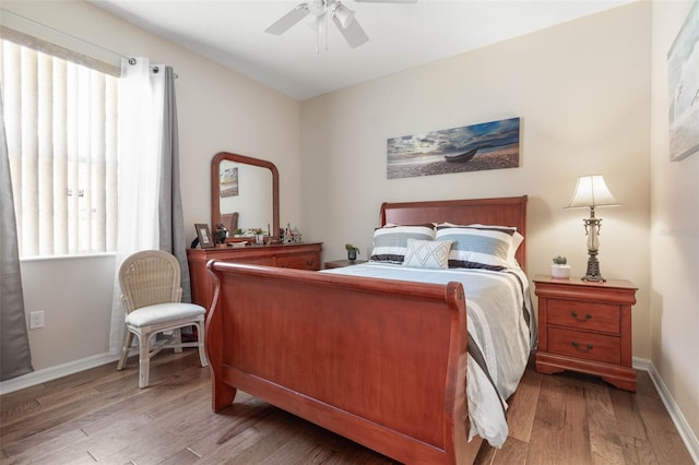 bedroom featuring ceiling fan and hardwood / wood-style floors