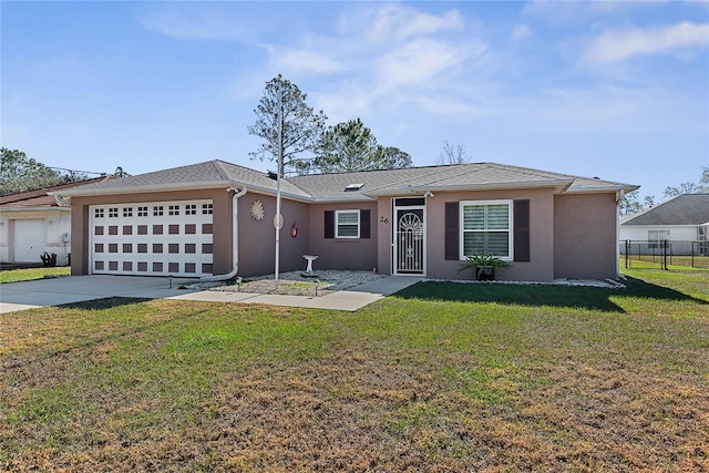 ranch-style home featuring a front lawn and a garage