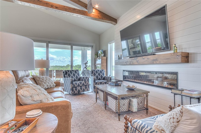 living room with light carpet, lofted ceiling with beams, a fireplace, and wooden walls