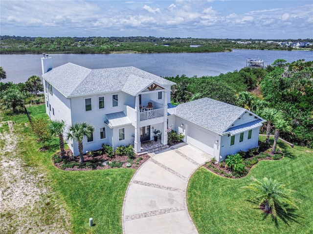 drone / aerial view with a water view