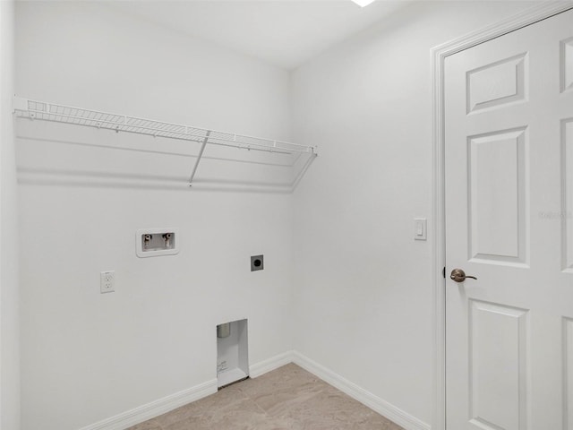 washroom featuring washer hookup, hookup for an electric dryer, and light tile patterned floors