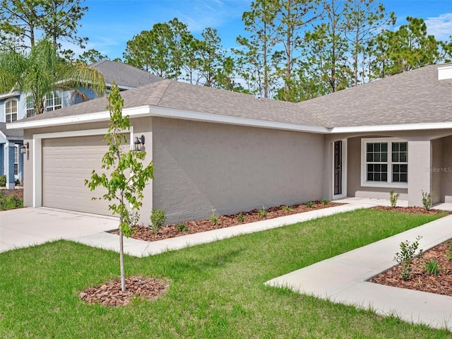 view of front facade featuring a front lawn and a garage