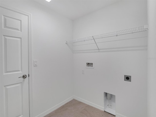 clothes washing area with light tile patterned floors, washer hookup, and electric dryer hookup