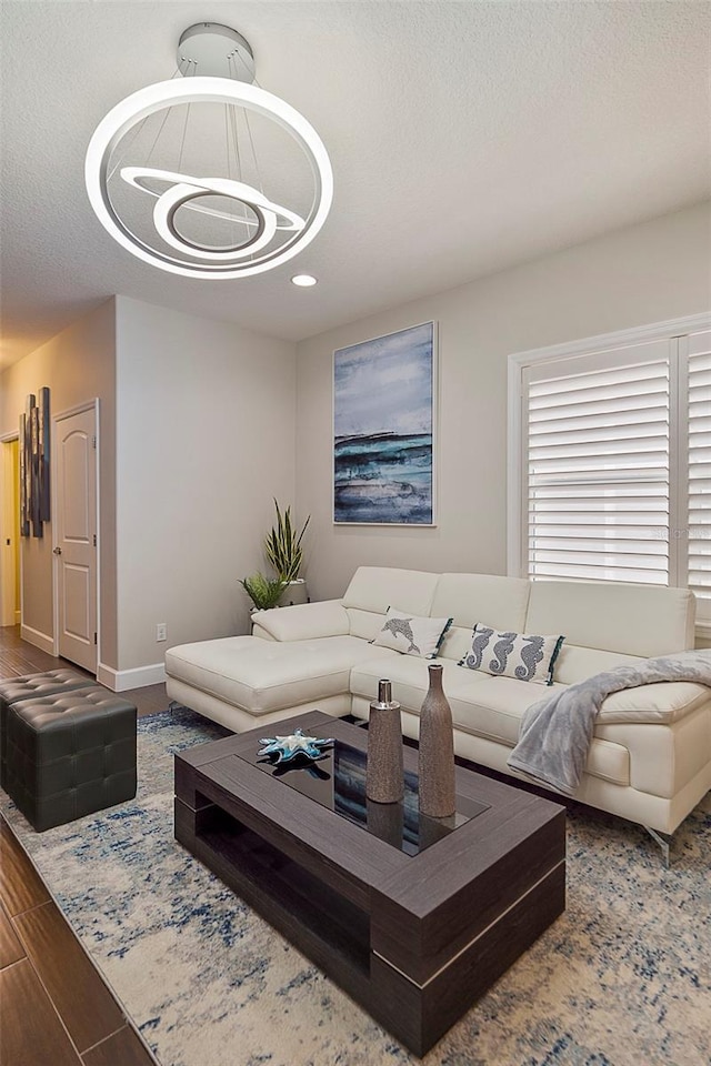 living room with a textured ceiling