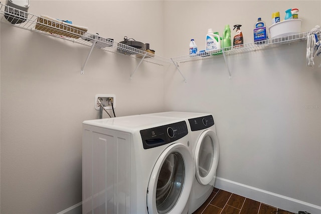 washroom featuring independent washer and dryer