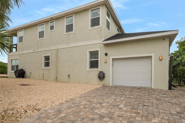 exterior space with a garage