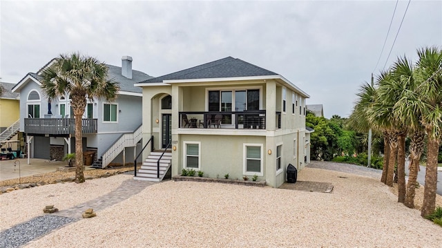 raised beach house with a garage