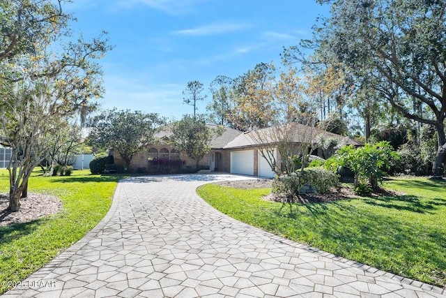 view of property exterior with a yard and a garage