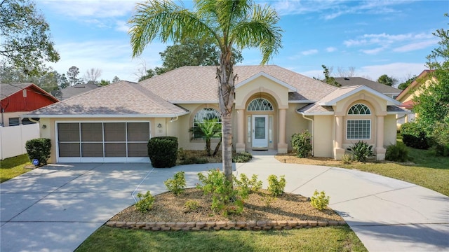 single story home with a garage