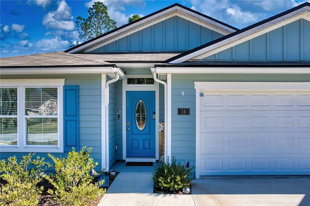 doorway to property featuring a garage