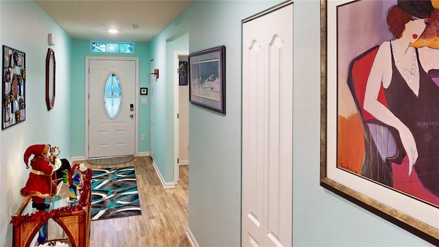 entrance foyer featuring light wood-type flooring